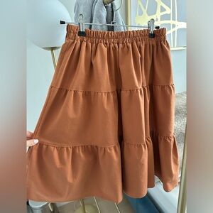 Eliyas Label flirt skirt size XS in burnt orange